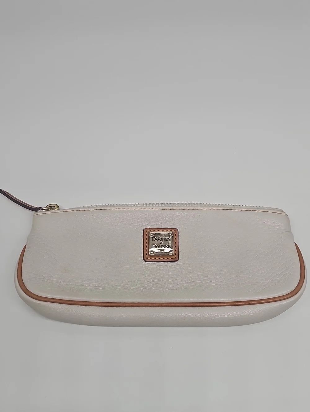Dooney & Bourke Cream Leather Pouch